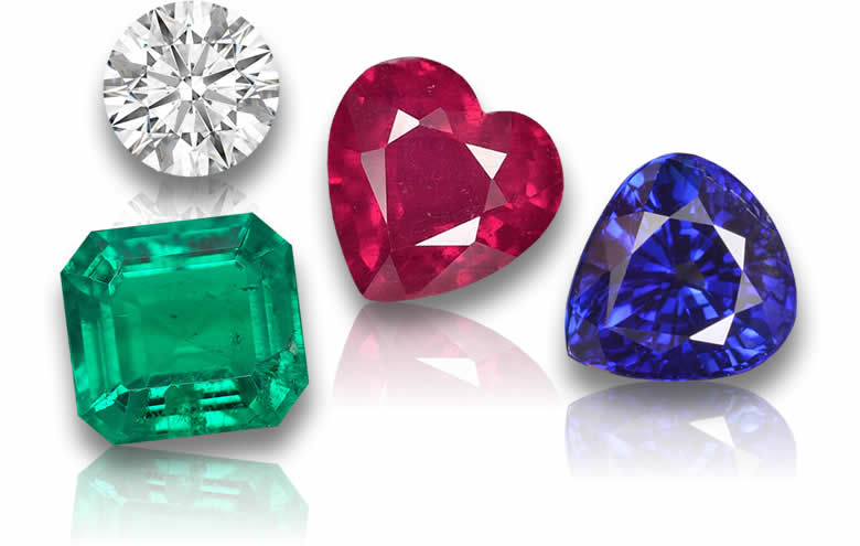 أحجار كريمة سائبة تشمل الياقوت والزمرد والماس