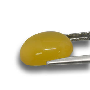 عقيق برتقالى-ذهبى طبيعي، قصة بيضاوى، 3.76 قيراط، نصف شفاف