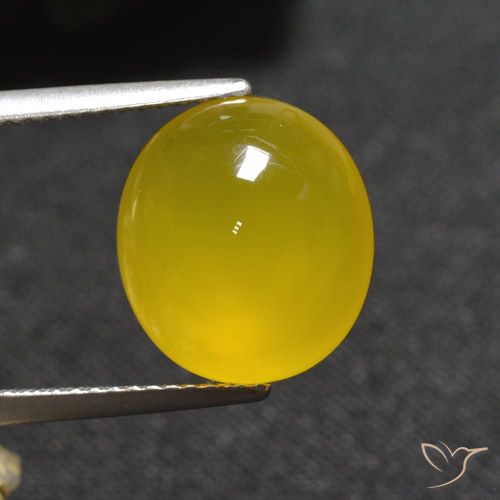 5.93ct طبيعي ذهبى مصفر عقيق, بيضوي, نصف شفاف