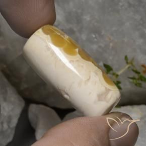 عقيق طبيعي بلون متعدد الألوان، وزن ‎56.94‎ قيراط، شكل شكل خيالي، مقاس ‎30.6x14.3‎ مم