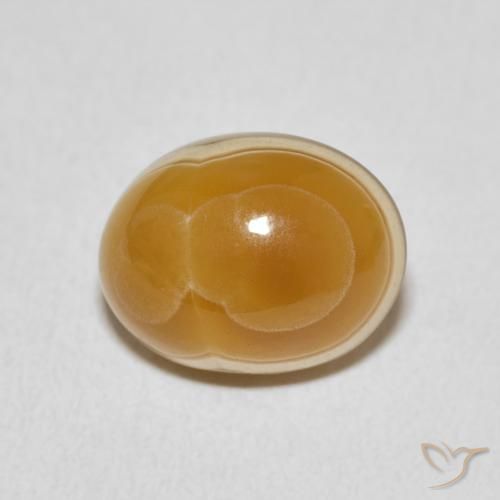 6.46ct طبيعي متعدد الألوان عقيق, بيضوي, غير شفاف
