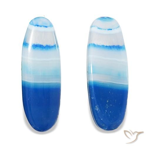 أحجار عقيق أزرق متعدد الألوان طبيعية، قصة بيضاوى، شفاف، وزنها 31.70 قيراط