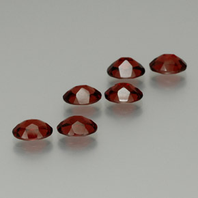 أحجار عقيق الألماندين أحمر غامق طبيعية، قصة بيضاوى، قليلا جدا، وزنها  قيراط
