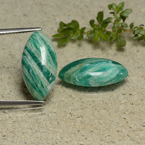 أمازونيت طبيعي بلون أخضر أناناسى، وزن ‎13.09‎ قيراط، شكل ماركيز، مقاس ‎19.8x10.1‎ مم