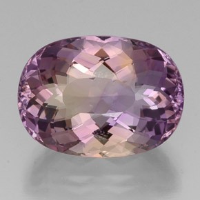 أمترين طبيعي بلون ثنائية اللون، وزن ‎19.15‎ قيراط، شكل بيضاوى، مقاس ‎19.9x14.6‎ مم