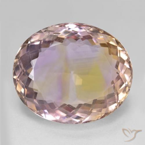 25.10ct طبيعي ثنائية اللون أميترين, بيضوي, VVS