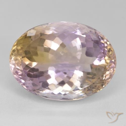 26.19ct طبيعي ثنائية اللون أميترين, بيضوي, قليلا جدا