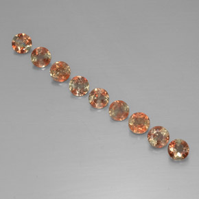 أحجار اندلوسيت متعدد الألوان طبيعية، قصة دائرى، قليلا جدا، وزنها  قيراط