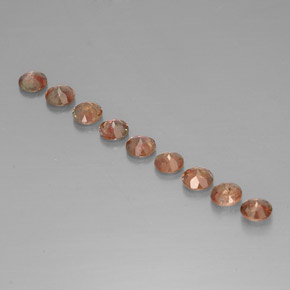 أحجار اندلوسيت متعدد الألوان طبيعية، قصة دائرى، قليلا جدا، وزنها  قيراط