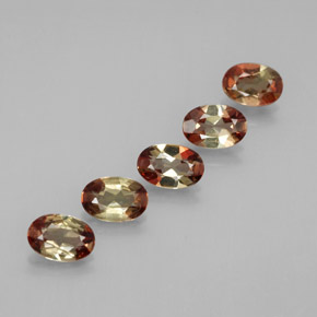 أحجار اندلوسيت متعدد الألوان طبيعية، قصة بيضاوى، قليلا جدا، وزنها  قيراط