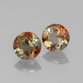 أحجار اندلوسيت متعدد الألوان طبيعية، قصة دائرى، قليلا جدا، وزنها  قيراط