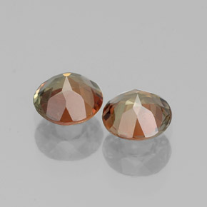 أحجار اندلوسيت متعدد الألوان طبيعية، قصة دائرى، قليلا جدا، وزنها  قيراط