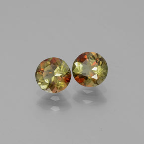 أحجار اندلوسيت متعدد الألوان طبيعية، قصة دائرى، قليلا جدا، وزنها  قيراط