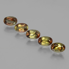 أحجار اندلوسيت متعدد الألوان طبيعية، قصة بيضاوى، قليلا جدا، وزنها  قيراط