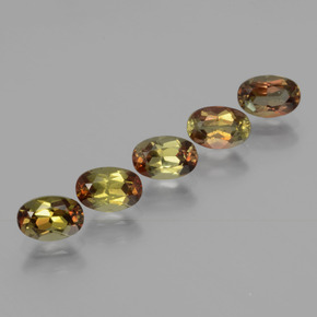 أحجار اندلوسيت متعدد الألوان طبيعية، قصة بيضاوى، قليلا جدا، وزنها  قيراط