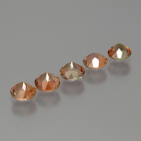 أحجار اندلوسيت برتقالى بنى طبيعية، قصة دائرى، قليلا جدا، وزنها  قيراط