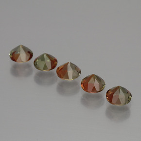 أحجار اندلوسيت متعدد الألوان طبيعية، قصة دائرى، قليلا جدا، وزنها  قيراط