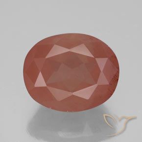 4.17ct طبيعي برتقالى محمر باهت لابرادوريت أنديسين, بيضوي, شفاف / نصف شفاف