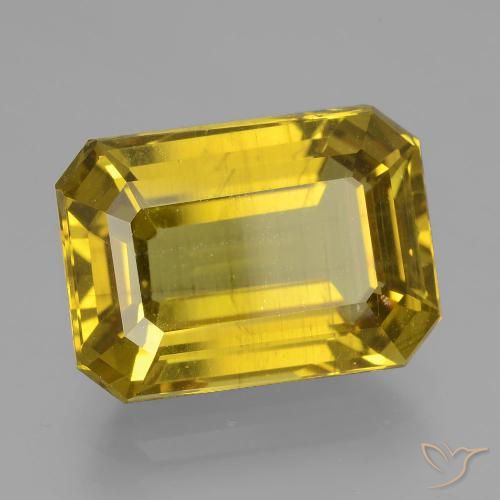 10.57ct طبيعي أصفر غامق الأباتيت, قص الزمرد, قليلا جدا