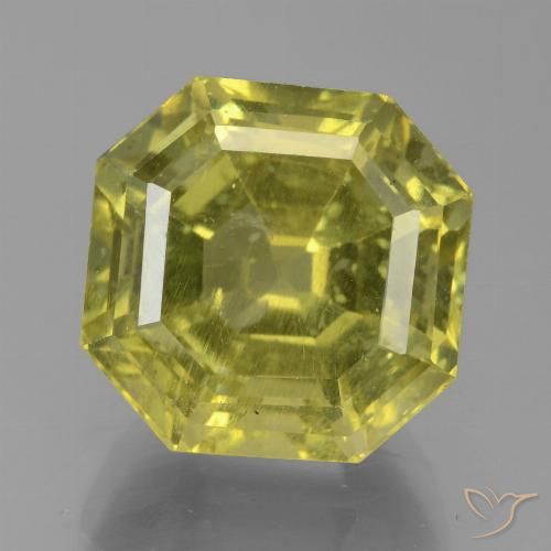 9.42ct طبيعي أصفر متوسط الأباتيت, قص الزمرد, قليلا جدا