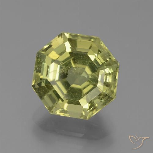 4.29ct طبيعي أصفر متوسط الأباتيت, قص الزمرد, قليلا جدا
