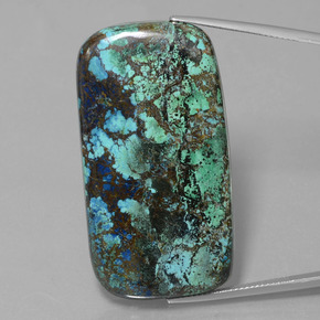 أزوريت طبيعي بلون أزرق متعدد الألوان، وزن ‎76.94‎ قيراط، شكل قطع وسادة، مقاس ‎43.7x23.4‎ مم