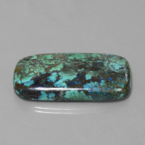 أزوريت طبيعي بلون أزرق متعدد الألوان، وزن ‎76.94‎ قيراط، شكل قطع وسادة، مقاس ‎43.7x23.4‎ مم