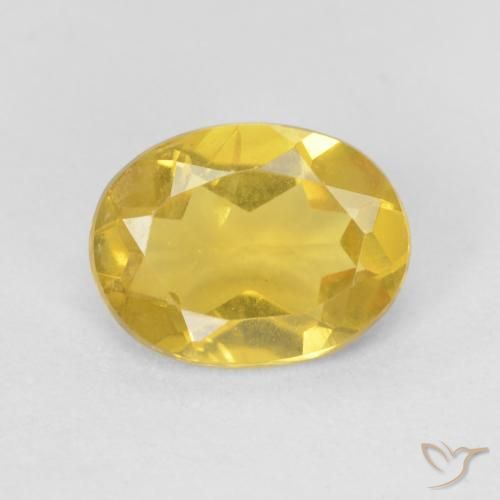 0.89ct طبيعي أصفر-ذهبى فاتح بيريل, بيضوي, قليلا جدا