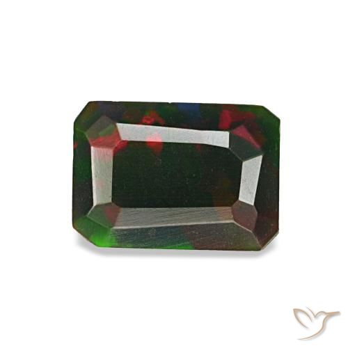 أوبال أسود طبيعي بلون متعدد الألوان، وزن ‎0.57‎ قيراط، شكل قص الزمرد، مقاس ‎6.6x4.7‎ مم