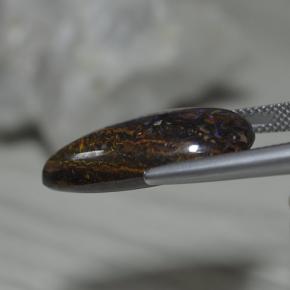 أوبال بولدر طبيعي بلون متعدد الألوان، وزن ‎17.27‎ قيراط، شكل شكل الكمثرى، مقاس ‎23.5x13.5‎ مم