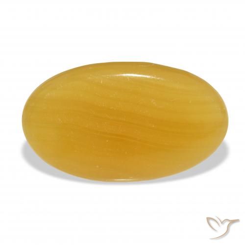 32.11ct طبيعي برتقالى-ذهبى الكالسيت, بيضوي, نصف شفاف