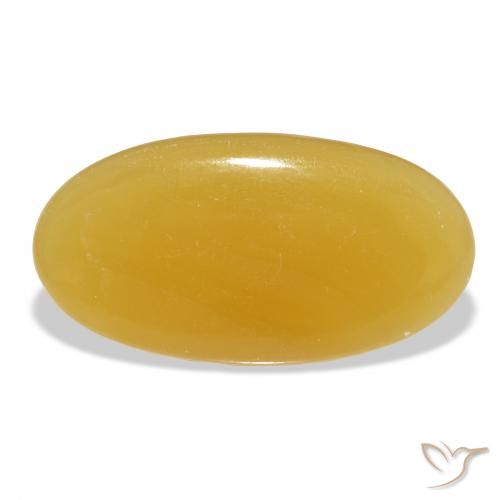 34.58ct طبيعي برتقالى-ذهبى الكالسيت, بيضوي, نصف شفاف