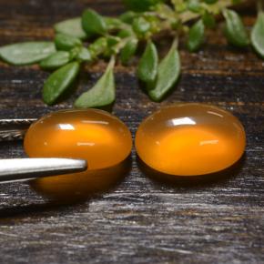 أحجار كارنيليان برتقالي طبيعية، قصة بيضاوى، نصف شفاف، وزنها 2.65 قيراط