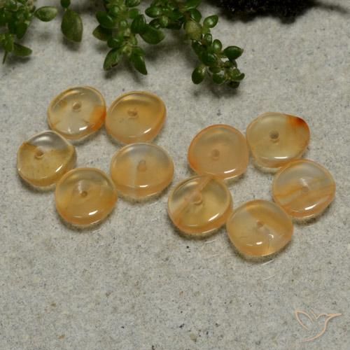 أحجار كارنيليان برتقالي زاهى طبيعية، شكل خيالي، شفاف، وزنها 3.41 قيراط