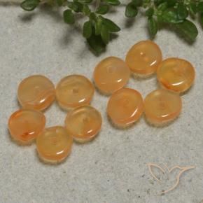 أحجار كارنيليان برتقالى متوسط طبيعية، شكل خيالي، نصف شفاف، وزنها 4.00 قيراط