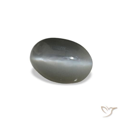 Cat's Eye Alexandrite طبيعي بلون رمادى متوسط، وزن ‎0.33‎ قيراط، شكل بيضاوى، مقاس ‎5x3.4‎ مم