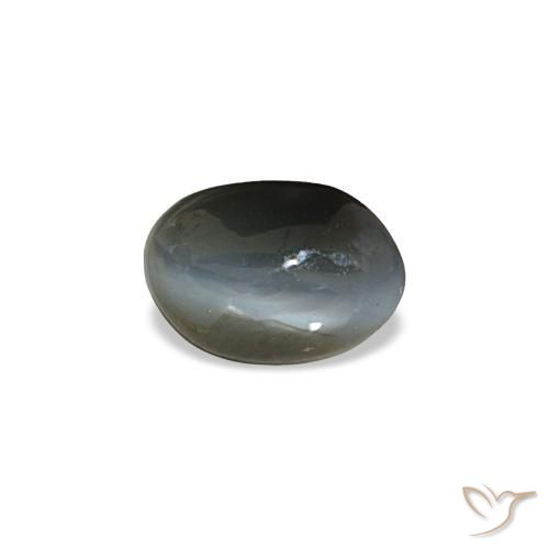 Cat's Eye Alexandrite طبيعي بلون رمادى مخضر-باهت، وزن ‎0.45‎ قيراط، شكل بيضاوى، مقاس ‎5.2x3.6‎ مم