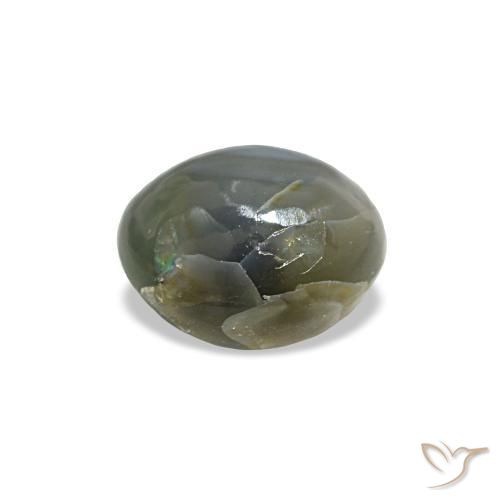 Cat's Eye Alexandrite طبيعي بلون رمادى متوسط، وزن ‎0.79‎ قيراط، شكل بيضاوى، مقاس ‎5.3x4.7‎ مم