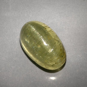 Cat's Eye Apatite طبيعي بلون أصفر أخضر، وزن ‎5.71‎ قيراط، شكل شفاف، مقاس ‎12x7.3‎ مم