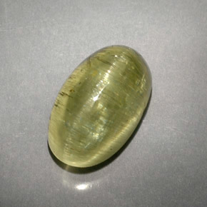 Cat's Eye Apatite طبيعي بلون أصفر أخضر، وزن ‎5.71‎ قيراط، شكل شفاف، مقاس ‎12x7.3‎ مم
