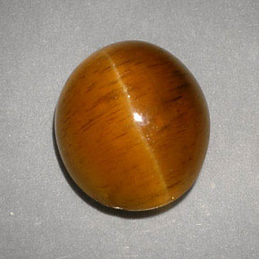 Cat's Eye Apatite طبيعي بلون عسلي، وزن ‎5.05‎ قيراط، شكل شفاف، مقاس ‎10.4x9‎ مم