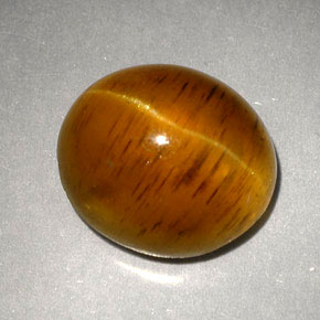 Cat's Eye Apatite طبيعي بلون عسلي، وزن ‎5.05‎ قيراط، شكل شفاف، مقاس ‎10.4x9‎ مم