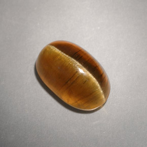 Cat's Eye Apatite طبيعي بلون عسلي، وزن ‎4.93‎ قيراط، شكل شفاف، مقاس ‎10.8x7.2‎ مم