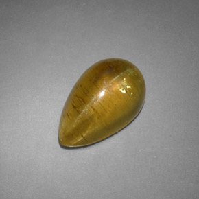 Cat's Eye Apatite طبيعي بلون ذهبي مخضر، وزن ‎4.09‎ قيراط، شكل شفاف، مقاس ‎12.2x7.7‎ مم