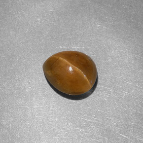 Cat's Eye Apatite طبيعي بلون عسلي، وزن ‎1.46‎ قيراط، شكل شكل الكمثرى، مقاس ‎7.3x6‎ مم
