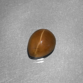 Cat's Eye Apatite طبيعي بلون عسلي، وزن ‎1.46‎ قيراط، شكل شكل الكمثرى، مقاس ‎7.3x6‎ مم