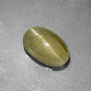 Cat's Eye Apatite طبيعي بلون أصفر أخضر، وزن ‎0.96‎ قيراط، شكل شفاف، مقاس ‎7.4x4.7‎ مم