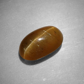 Cat's Eye Apatite طبيعي بلون عسلي، وزن ‎2.44‎ قيراط، شكل بيضاوى، مقاس ‎9.7x5.9‎ مم