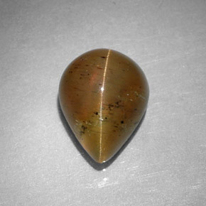 Cat's Eye Apatite طبيعي بلون عسلي، وزن ‎2.97‎ قيراط، شكل شكل الكمثرى، مقاس ‎9.6x7.6‎ مم