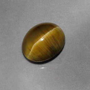 Cat's Eye Apatite طبيعي بلون أخضر ذهبي، وزن ‎1.87‎ قيراط، شكل شفاف، مقاس ‎7.9x6.5‎ مم